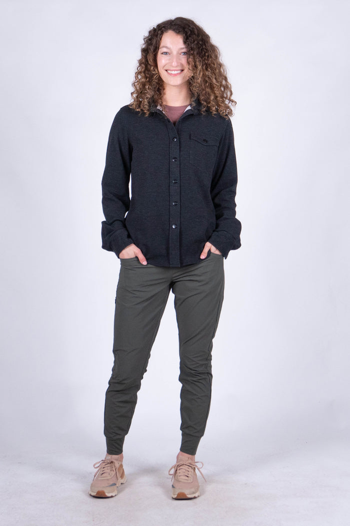 Women's fleece button-up shirt in dark charcoal, front view, long sleeves with chest pocket