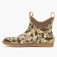 Camouflage rubber ankle deck boot with pull tabs, tan collar lining, and gum sole, side view