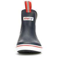 Ankle-height rubber deck boot in navy with red accents, front view, pull tab visible