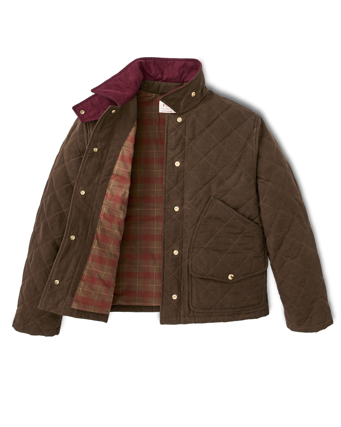 Quilted brown jacket with snap buttons, plaid lining, stand collar, and chest pocket, open front view
