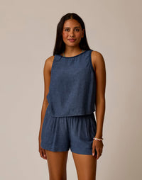 Women's sleeveless linen tank top and shorts set in blue chambray fabric