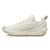 Women's trail running shoe in off-white, lateral view, with lugged outsole and mesh upper