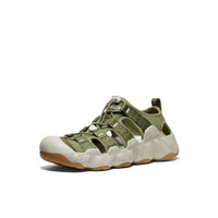 Olive green sport sandal with protective toe cap and light gray sole, side view