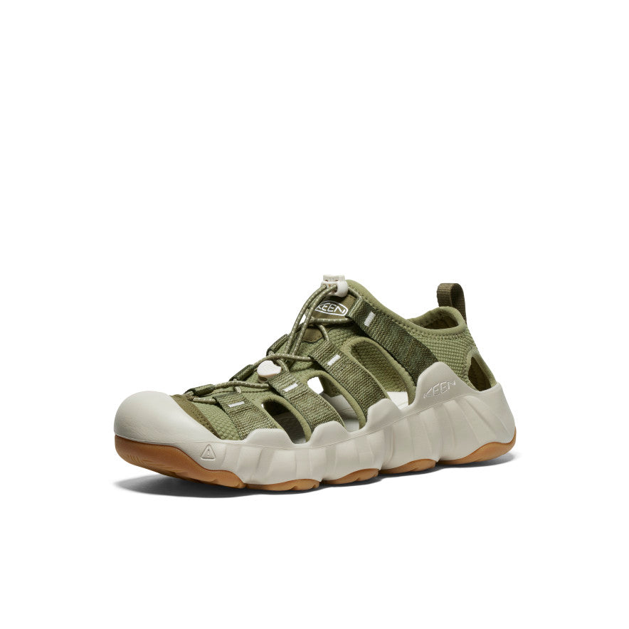 Olive green sport sandal with protective toe cap and light gray sole, side view