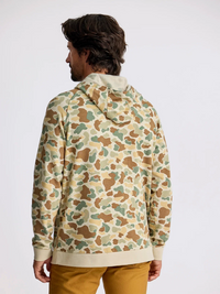 Men's camo pullover hoodie shown from the back, featuring earth-tone camouflage pattern and ribbed hem