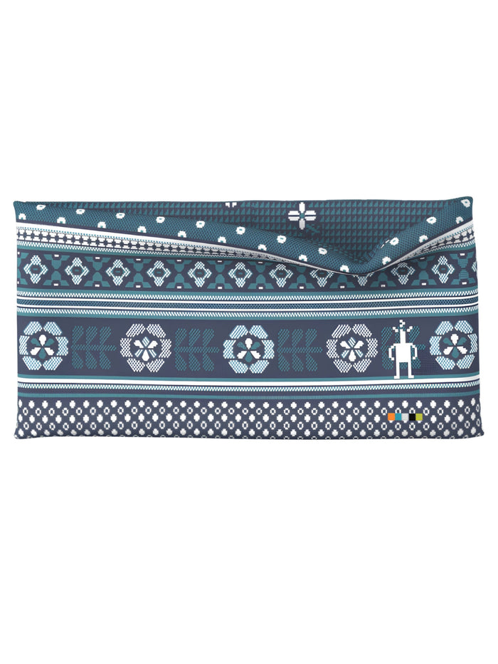 Reversible merino wool headband with Fair Isle geometric pattern in dark teal and white, flat lay view