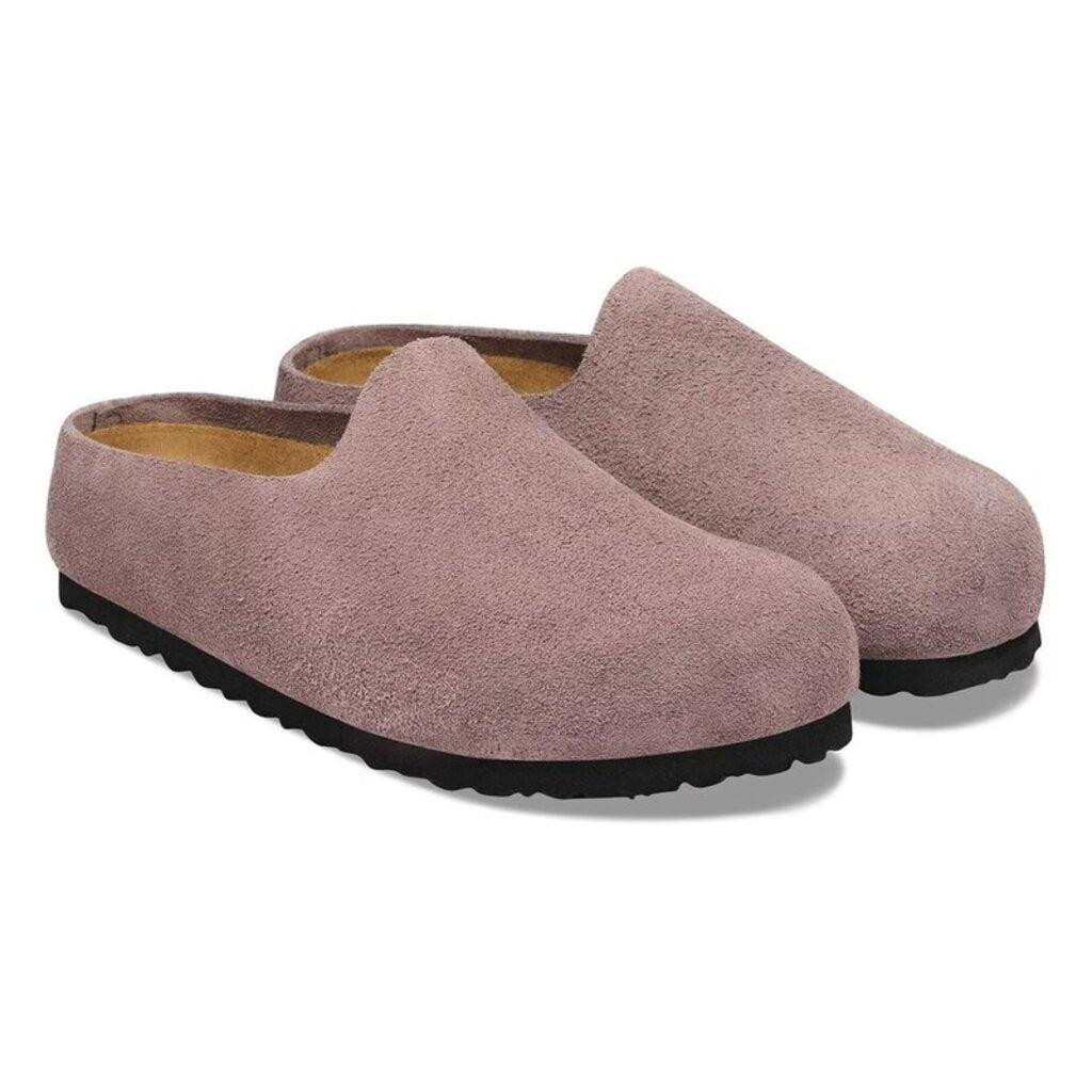 Pair of suede slip-on clogs with closed toe, textured sole, and tan footbed lining