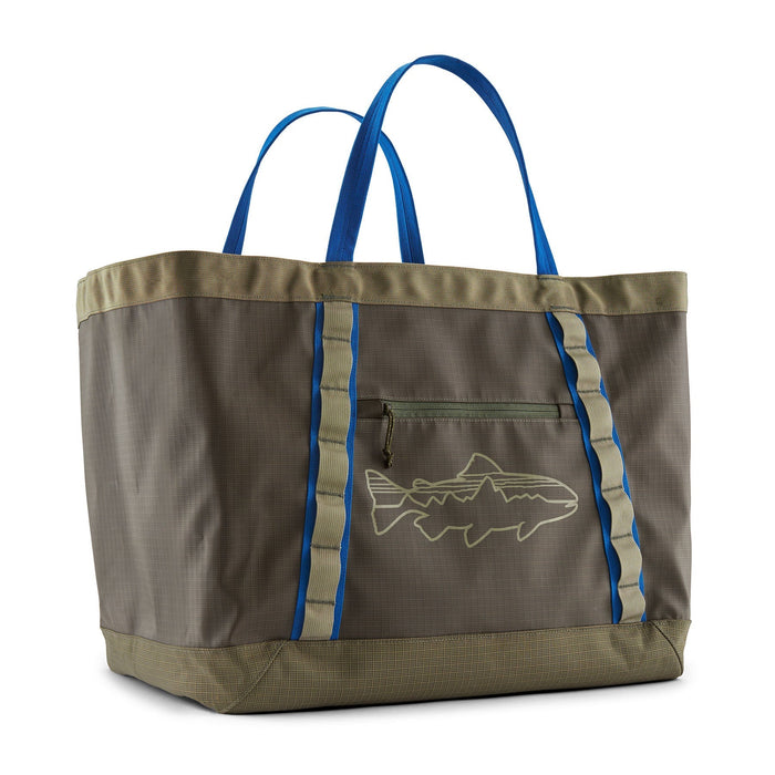 Large canvas tote bag with blue handles, zippered pocket, and fish logo design