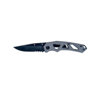 Folding tactical pocket knife with black serrated blade and gray skeletonized handle, side view