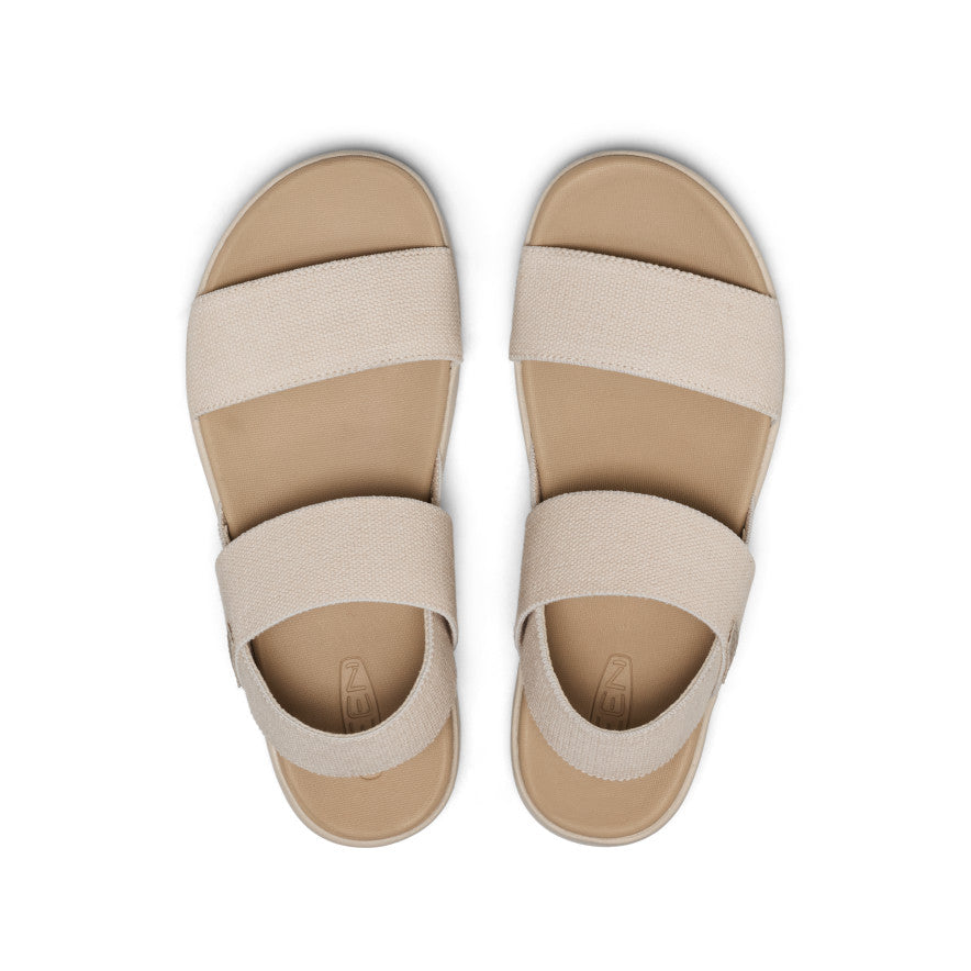 Women's elastic strap sandals with beige straps and tan footbed, top view