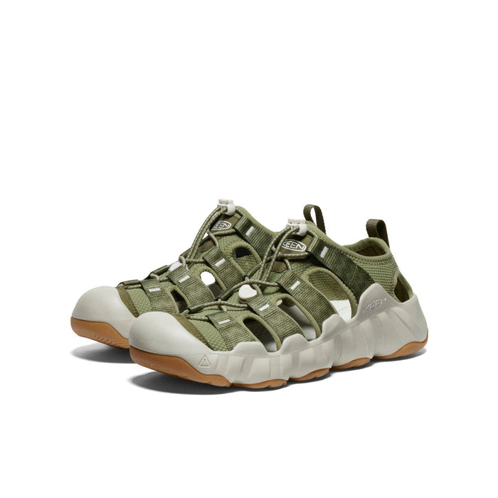 Olive green athletic water sandals with protective toe cap and light gray sole