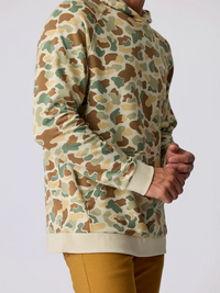 Men's camo print pullover hoodie, side view showing kangaroo pocket and ribbed cuffs