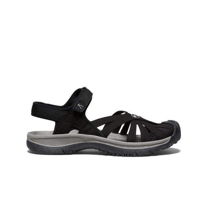 Black sport sandal with closed toe, adjustable straps, and gray cushioned sole, side view