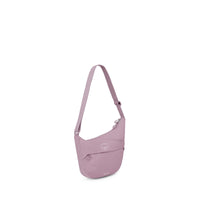 Small crescent-shaped crossbody pouch with adjustable strap and front zip pocket, side view