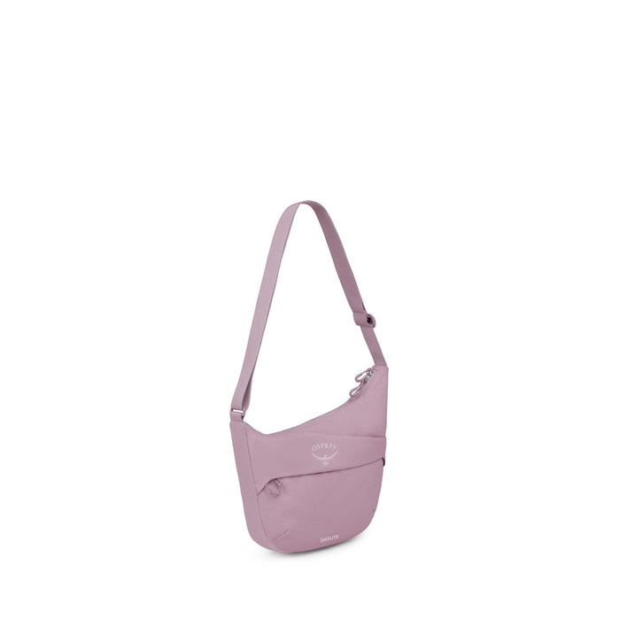 Small crescent-shaped crossbody pouch with adjustable strap and front zip pocket, side view