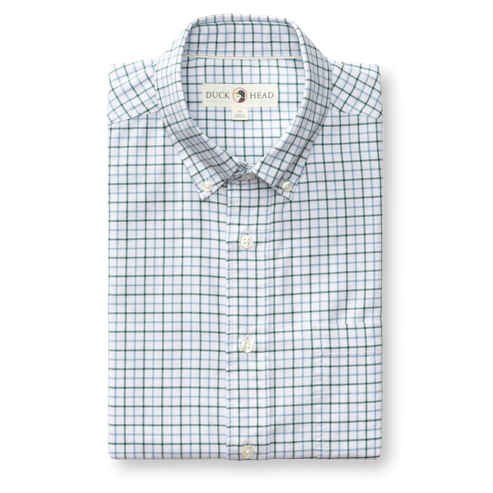 Folded long-sleeve button-down Oxford shirt with green and blue plaid check pattern, button-down collar