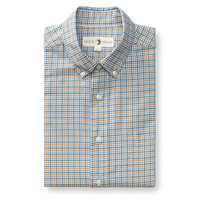 Folded long-sleeve button-down Oxford shirt in blue and amber plaid pattern with button-down collar