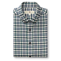 Folded plaid flannel button-down shirt with button-down collar, teal and navy checks on cream