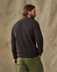 Men's waffle knit crewneck sweater, back view, paired with olive green pants