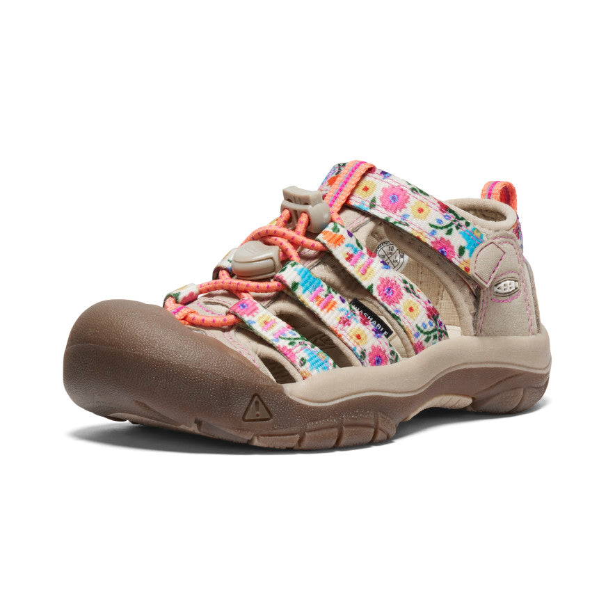 Children's protective sandal with colorful floral pattern straps and closed toe design