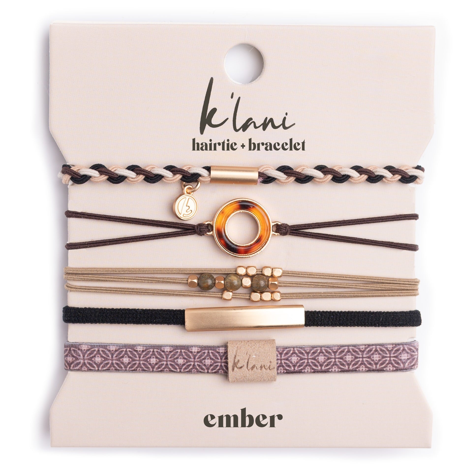 Set of five hair tie bracelets in warm neutrals with gold accents, braided and elastic styles on display card
