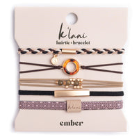 Set of five hair tie bracelets in warm neutrals with gold accents, braided and elastic styles on display card