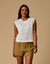 Women's sleeveless open-knit sweater vest in off-white with diamond pattern, front view