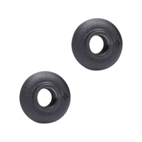 Pair of round black trekking pole baskets with central hole, top-down angle