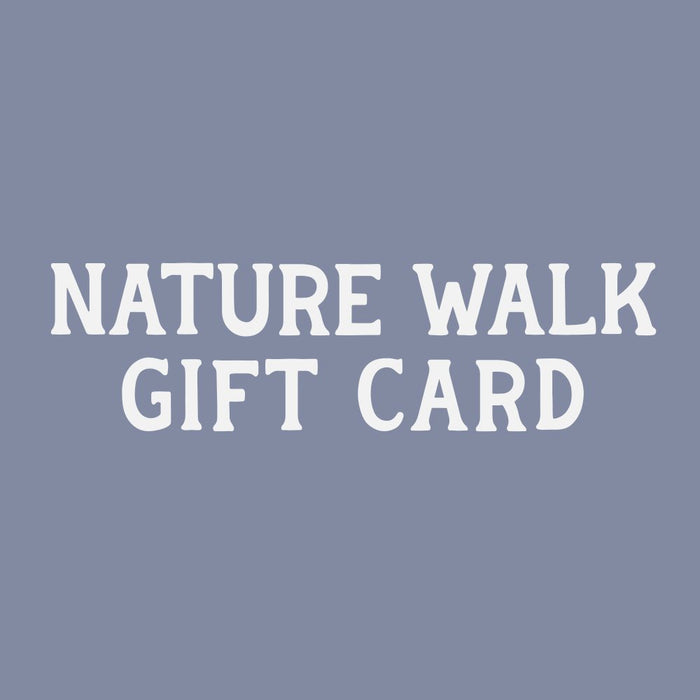 Gift card with bold white text on a muted blue-gray background, front view