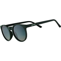 Dark green round sunglasses with gradient lenses shown at three-quarter angle