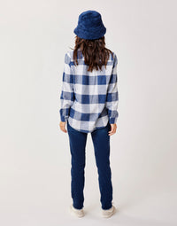 Women's plaid flannel shirt in navy and white check, back view, long sleeves