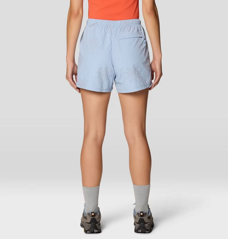 Women's light blue printed athletic shorts, back view, with elastic waistband and zip pocket