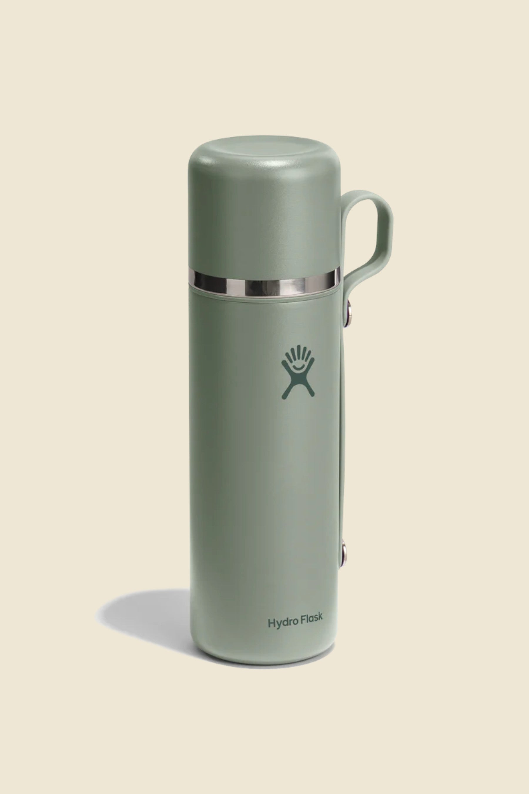 Insulated stainless steel thermos flask with attached cup lid and handle, front view