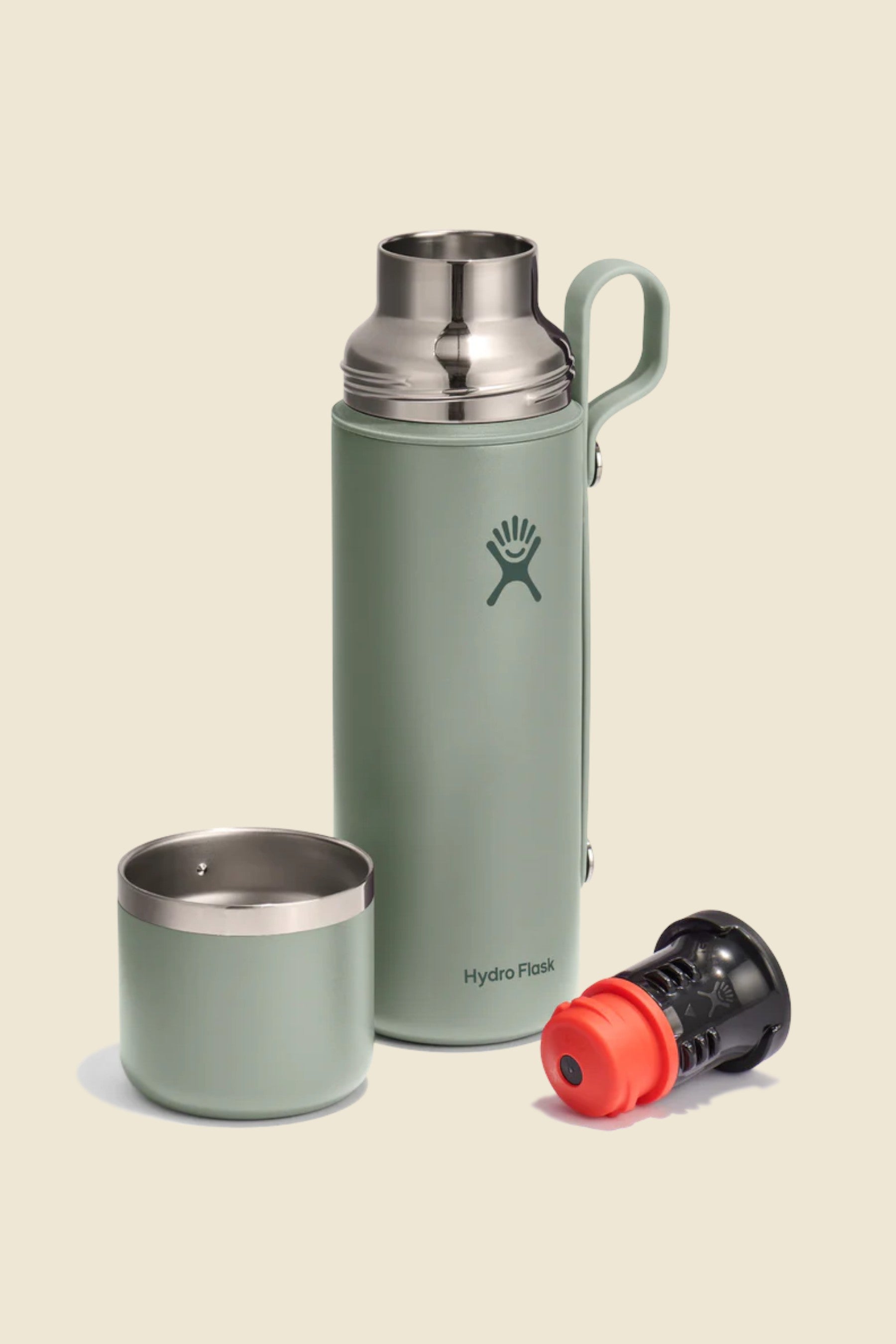Insulated stainless steel flask with matching cup and filter cap, disassembled view