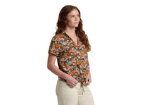 Women's short sleeve button-up shirt with dark floral print, three-quarter view