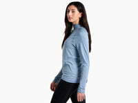 Light blue long-sleeve pullover with quarter-zip and mock neck, worn by model