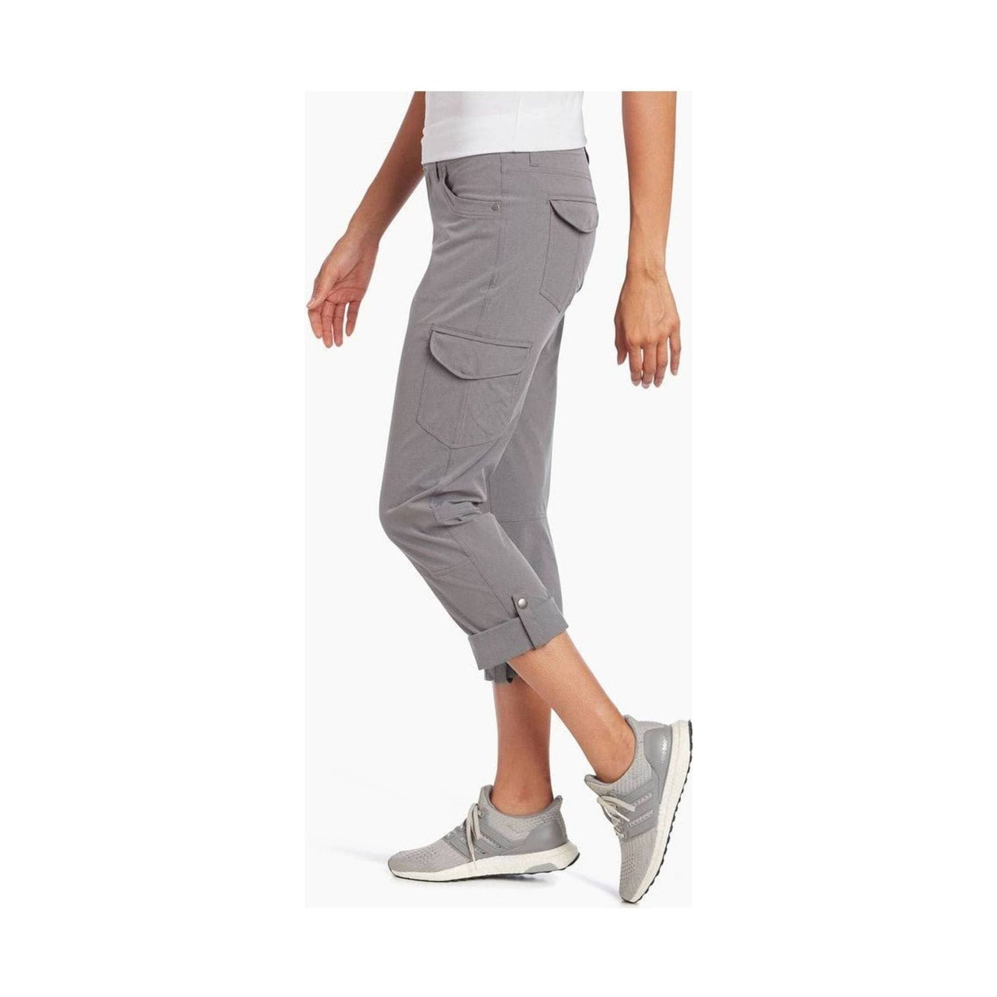 Women's gray cargo capri pants with roll-up cuffs and multiple pockets, side view