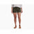 Woman wearing olive green cargo shorts with white linen shirt and brown sandals