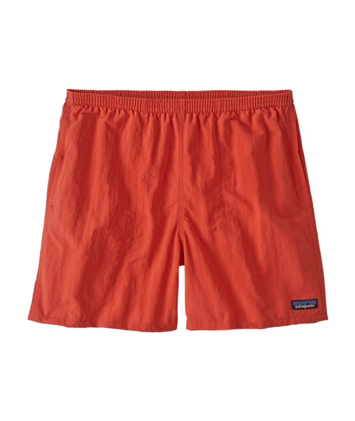 Bright orange-red athletic shorts with elastic waistband and small logo patch, front view