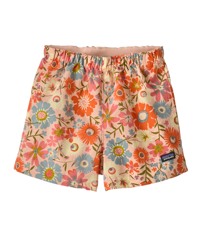 Toddler shorts with elastic waistband featuring vibrant floral print on peachy background