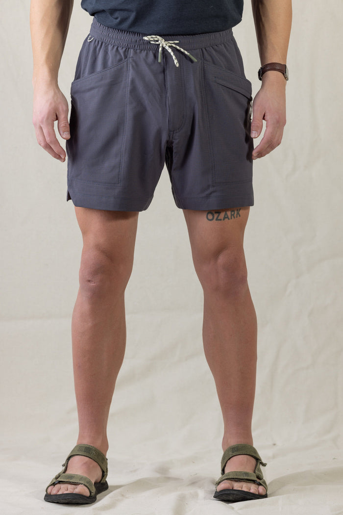 Men's athletic shorts in dark gray with drawstring waist and side pockets, front view
