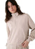 Women's half-zip pullover sweatshirt in light beige with mock neck collar, front view