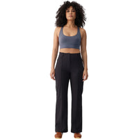 Women's high-waisted black wide-leg travel trousers with front seam detail, full-length front view