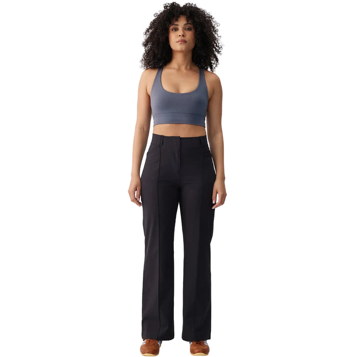 Women's high-waisted black wide-leg travel trousers with front seam detail, full-length front view