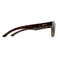 Tortoise shell patterned sunglasses shown from side profile view on white background