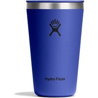 Deep blue insulated tumbler with press-in lid and stainless steel rim, front view