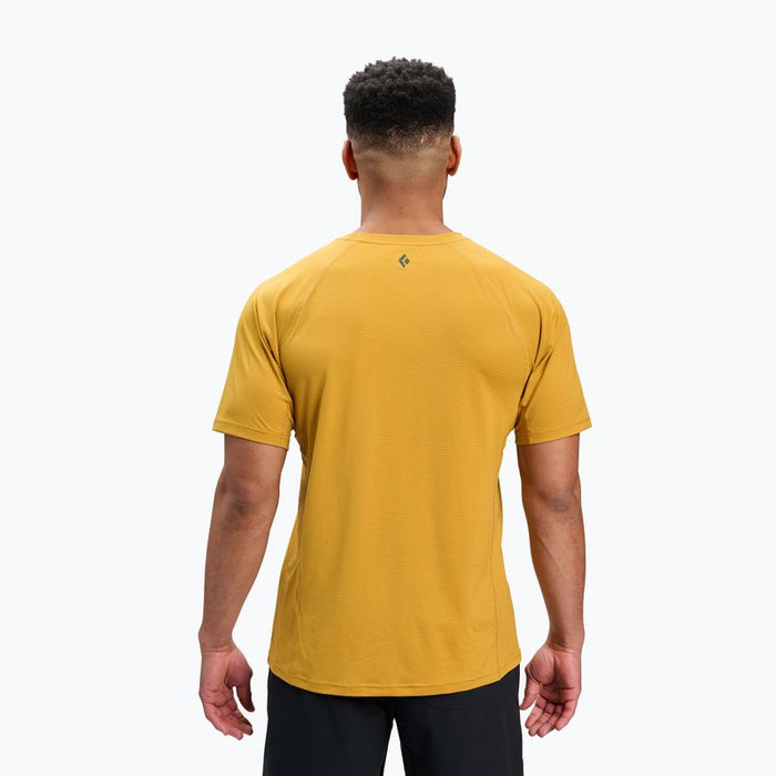 Golden yellow short sleeve athletic t-shirt shown from back view on male model