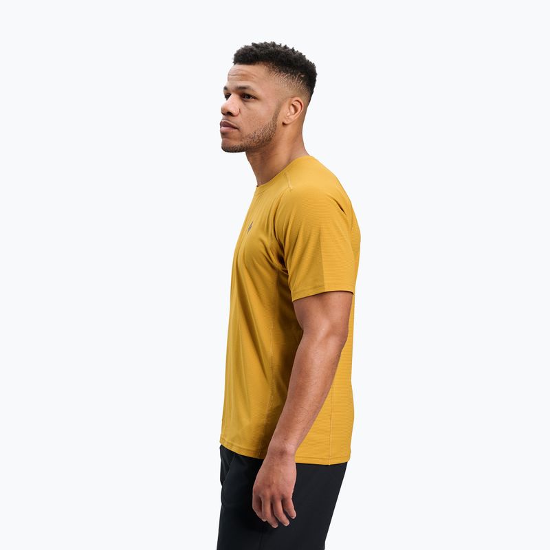 Men's athletic tech t-shirt in mustard yellow, side profile view on white background