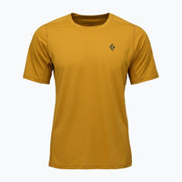 Mustard yellow short sleeve athletic t-shirt with crew neck, front view on white background