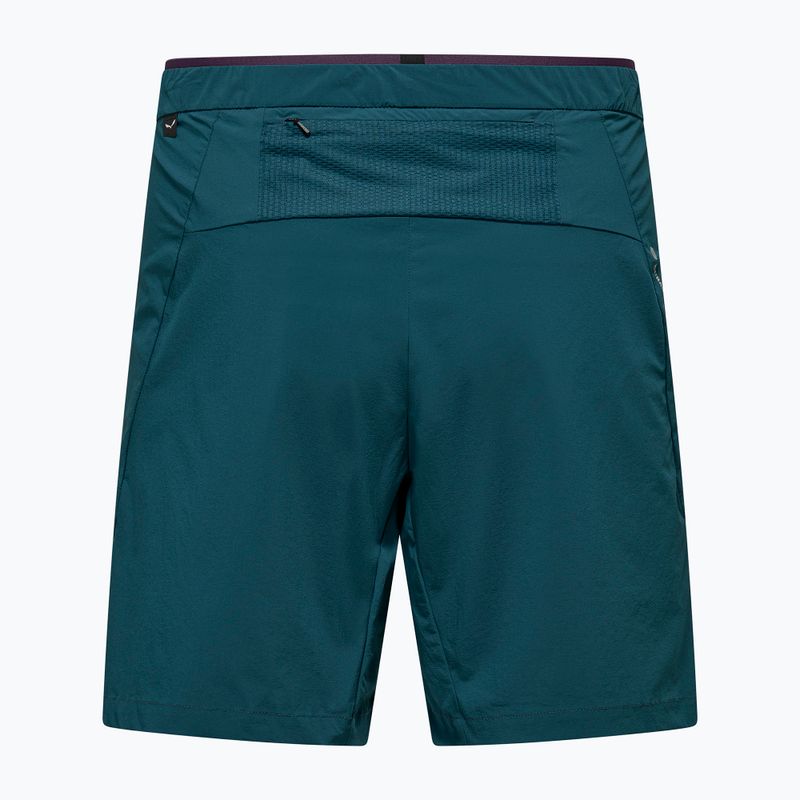 Teal athletic shorts with mesh waistband pocket and side zip, front view